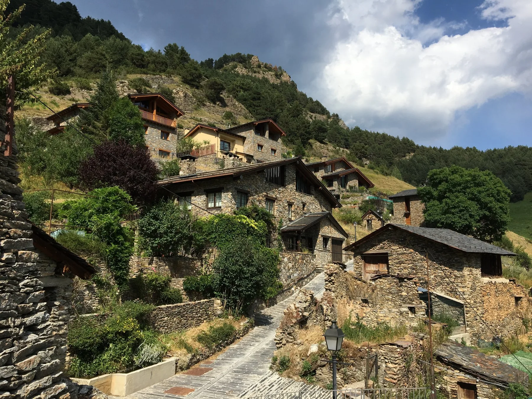 Sun-drenched stone houses in the village of Pal, Andorra